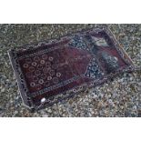 Small Perisan Red and Blue Ground Rug with stylised pattern, 97cms x 140cms together with another