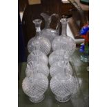 English hobnail cut wine ewer, together with six decanters, similar and two of larger size