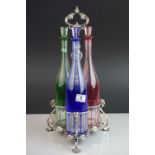 Set of Three Bohemian Coloured Glass Tall Decanters with Stoppers (blue, green and red) held on a