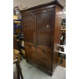 Early 19th century Mahogany Linen Press, the two upper panel doors opening to reveal four sliding