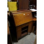 1930's / 40's Oak Bureau, the fitted interior over shelves, flanked by shelves to the sides, 71cms