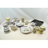 Collection of Four Continental Coffee Sets, one with papier mache tray, approx. 52 pieces total