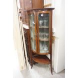 Edwardian Mahogany Inlaid Bow Fronted Corner Display Cabinet, the two glazed doors opening to reveal