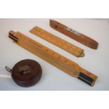 John Rabone & Sons win-up tape measure, boxwood and brass fold-up yardstick together with a