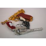 Three Toy Guns including Rustler Toy Gun, Gambler and Luger