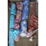 Four Rolls of Fabric