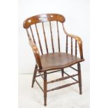 Late 19th / Early 20th century Oak Elbow Chair with Turned Spindle Back and a Pierced Hard Seat