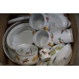 A large quantity of Worcester Evesham dinnerware to include Ramekins tureens serving dishes etc.