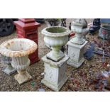 Pair of Garden Reconstituted Stone Urn Planters in Plinth Bases, 95cms high (one a/f)