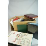 Quantity of albums including some with stamps etc.