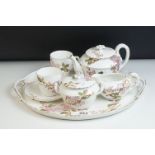 Limoge ' Tete a Tete ' Tea Set with cherry blossom decoration