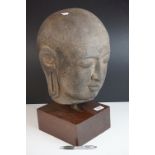 Large Composite Stone Buddha Head mounted on a Wooden Block Base, total height 49cms