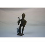 Tribal Man with sword and a de-capitated head, approx. 11.5cms high