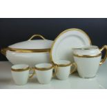 Limoges porcelain table service, with gold line border, comprising 23 plates and 12 soup bowls, 12
