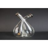 Silver Mounted Glass Cross-over Oil and Vinegar Bottles, with silver mounted original stoppers,