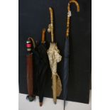 Three Parasols and a Bamboo Handled Umbrella