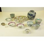 A group of Oriental ceramics to include Famille Rose, blue and white tea bowls, vase with figures in
