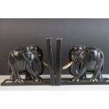 Pair of Early 20th century Ebony Elephant Bookends (one tusk missing), 19.5cms high