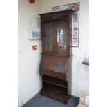 Late 19th century Arts and Crafts Oak Bureau Bookcase, the upper section with two leaded glazed