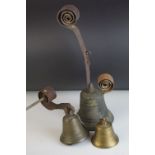 Three 19th century Coil Mounted Servant Bells, the largest 40cms high and marked 15