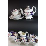 19th Century Staffordshire copper lustre part tea set, Painted with panels of pink flowers on a