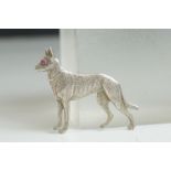 Sterling Silver Brooch in the form of a German Shepherd Dog with cabouchon ruby eye, 4cms long
