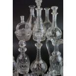 Collection of Nine Decanters and a Claret Jug, some with matched stoppers, together with a