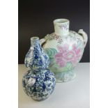 Chinese Double Gourd Vase, decorated with fruits and foliage in tones of underglazed blue, 35cms