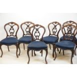 Set of Six Victorian Rosewood Dining Chairs, with shaped backs and scrolling carved splats, stuff