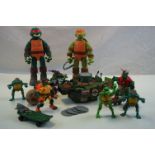 Collection of Teenage Mutant Turtles items including Figures