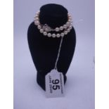 15" cultured pearl necklace, decorative clasp and safety chain