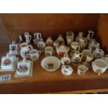 Complete shelf of crested ware including 8 items of Goss and Crested ware