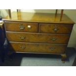 Early Georgian chest of 2 short and 2 long drawers, figurine walnut on pad feet with brass drop