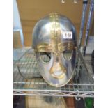 Anglo-Saxon Sutton Hoo steel and brass replica helmet, also included is a tunic