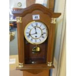 Modern 8 day wall clock, Westminster chiming working order, glass to the front door has been