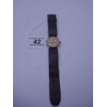 Art Deco period Gent's wrist watch, with leather strap, makers Tellus, inscription to back plate
