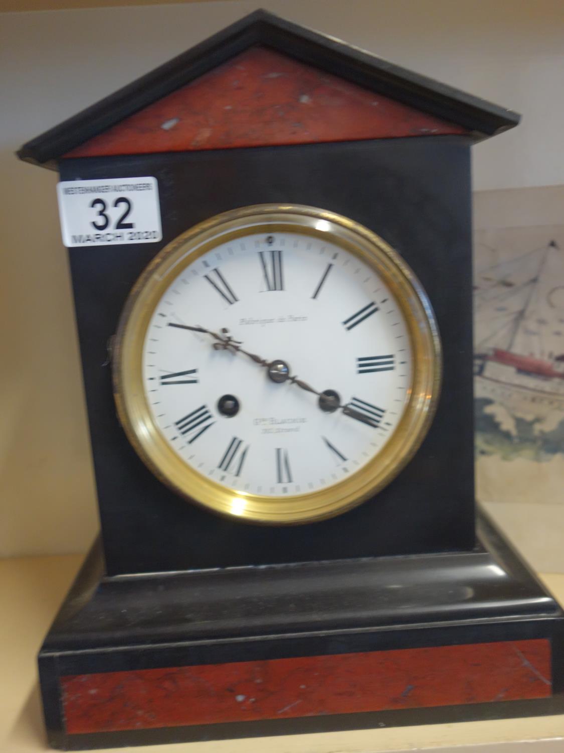 Marble french 8 day clock striking on a bell 10" tall supplied by George Blackie of the Strand