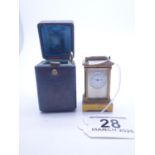 Good quality Fine Miniature travel clock, in original blue leather case, the miniature bronze