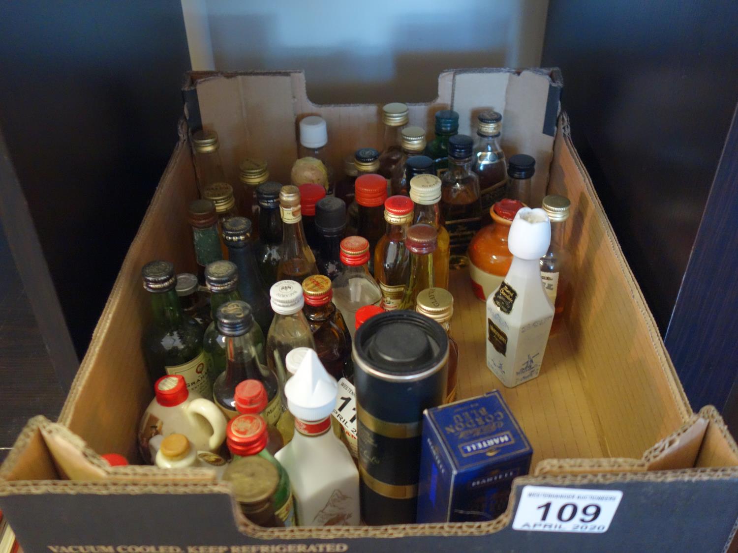 Box of various alcohol miniatures including Whiskies, Vodka's