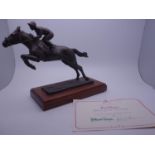 Danbury Mint a Bronze of Red Rum in action, No:38 with certificate of authenticity,