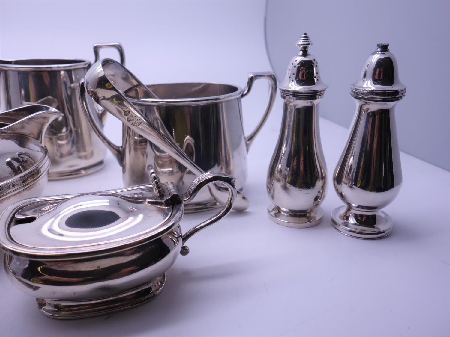 Cunard, White Star SHIPPING 9 items of SILVER plated ware by Ellington, each item marked to base