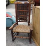 19 th Century Rocking chair with rush seated area to the top,