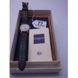 Raymond Weil, Gent's wrist watch on a leather strap, needs new battery, with original packaging