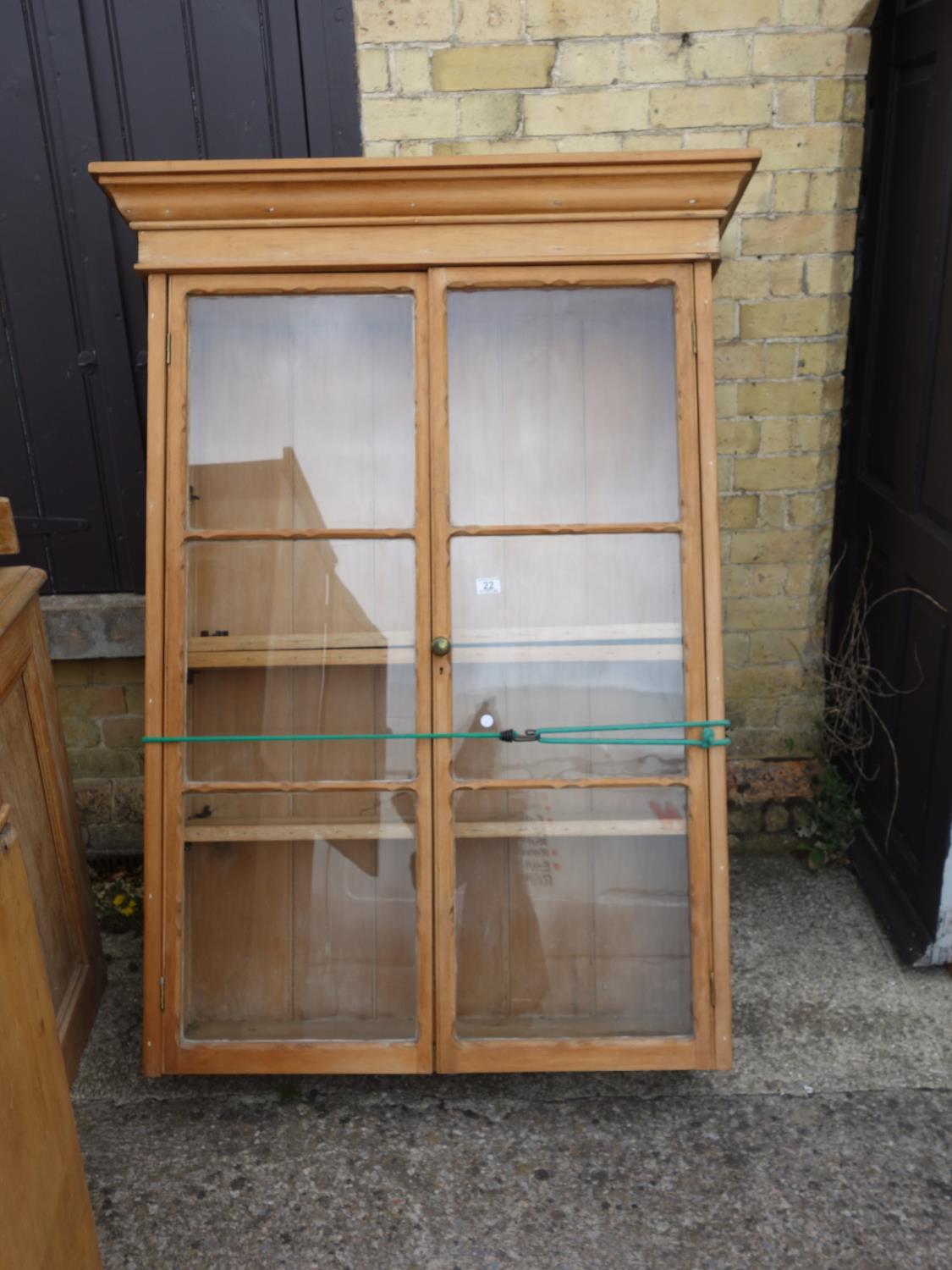 Pine bookcase with twin glazed top section 5'6 tall, base section containing 2 cupboards, 1 door - Image 2 of 2