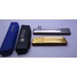 Harmonica Echo, by M Hohner, in original case, model 2509-48 7.5" long and a similar period