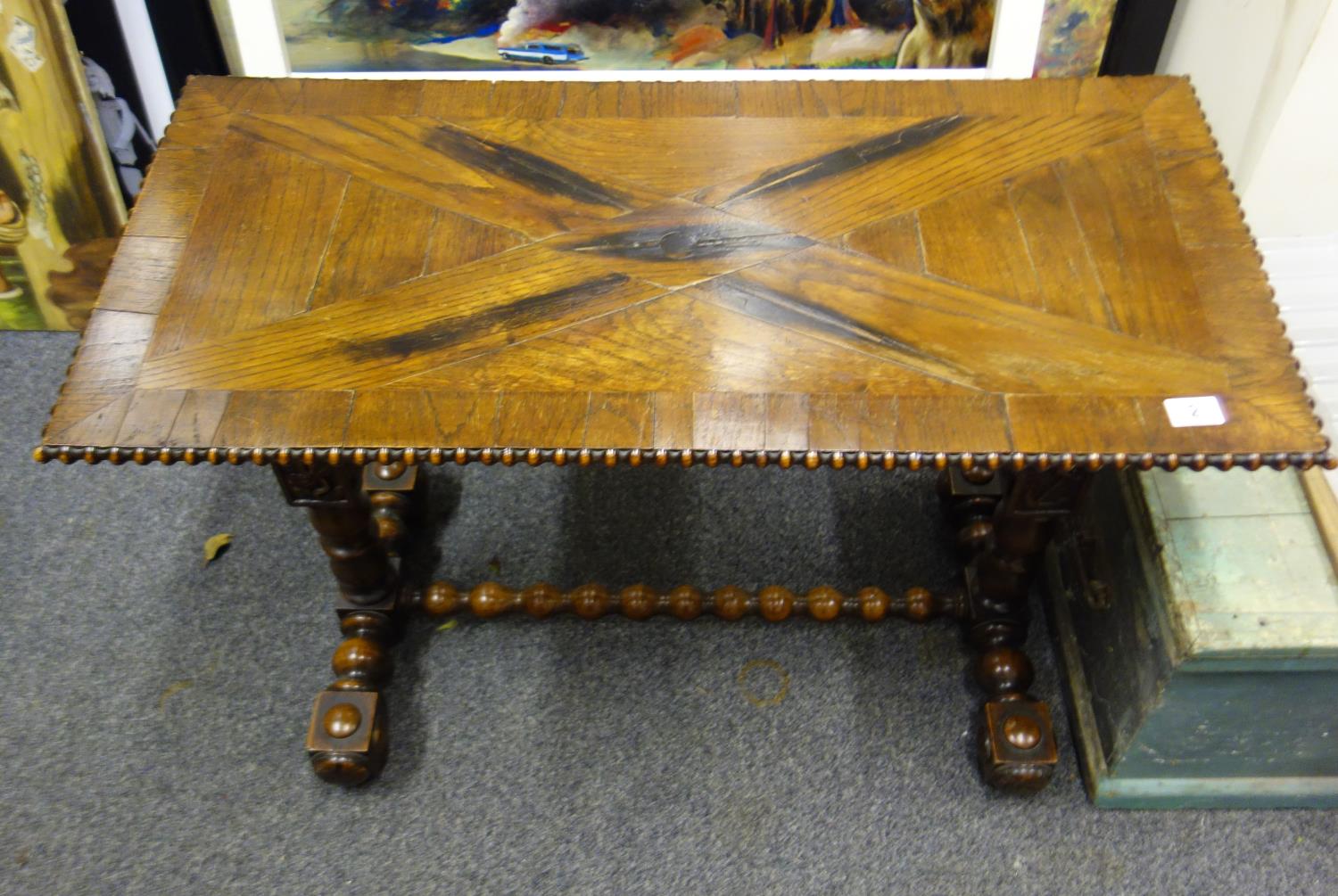 Nautical influenced 19th century sofa table with Marquerty design top above 2 columns each centre