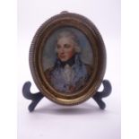 Miniature portrait oval, of a Naval Officer, thin white card, 3.5" long, 2.5" wide, un-signed