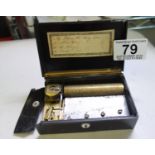 Miniature musical box playing on 4 airs 4" long,top with the Battle of Napoleon Austerlitz