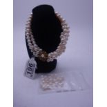 Superb Vintage Ladies triple strung natural Pearl necklace united with a 9ct gold clasp, the clasp