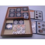 9 x assorted Commemorative coins in collectors capsules, 2 x folders containing Britain's First